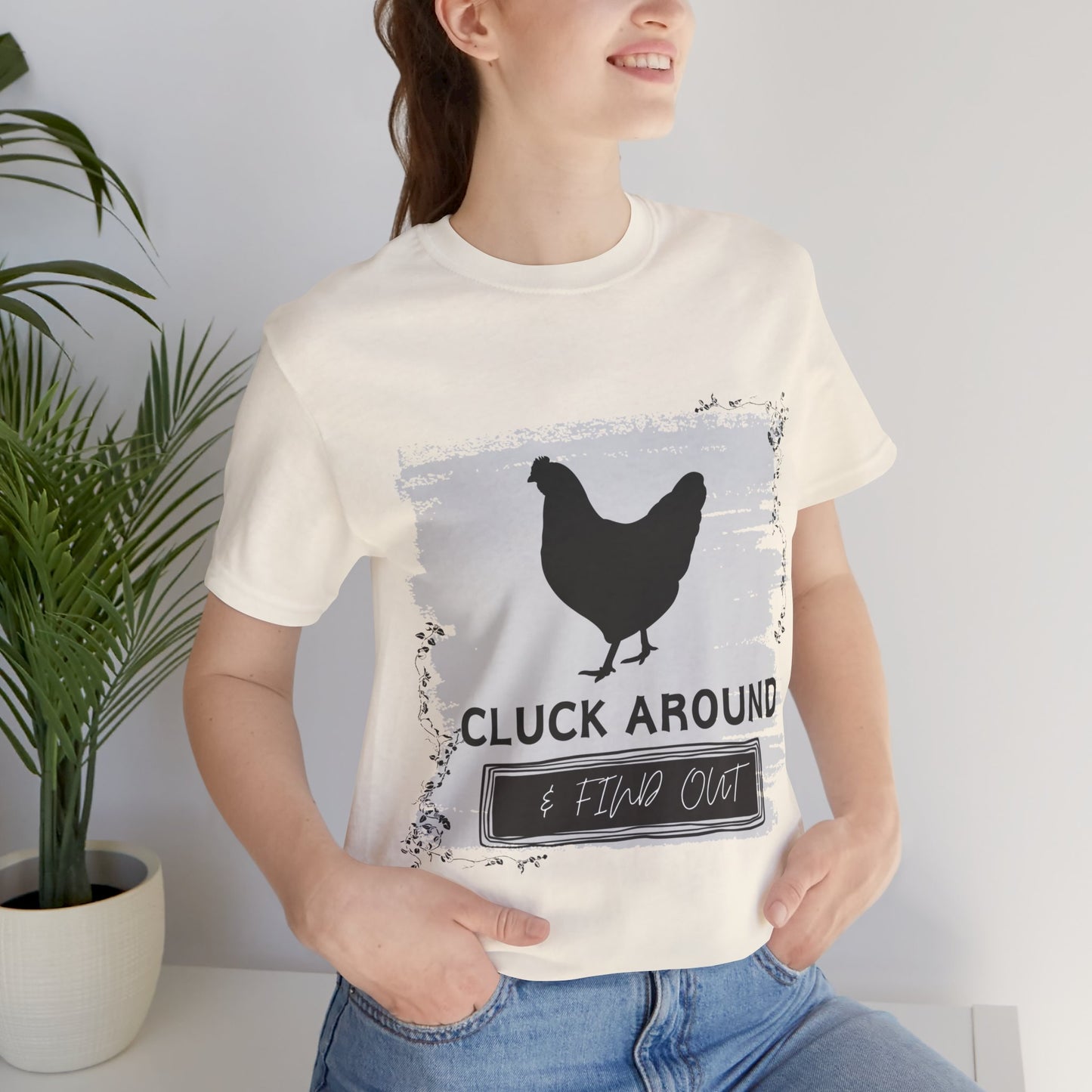 "Cluck Around & Find Out" One Sided Unisex Jersey Short Sleeve Tee (Printed on front) Chicken Shirt